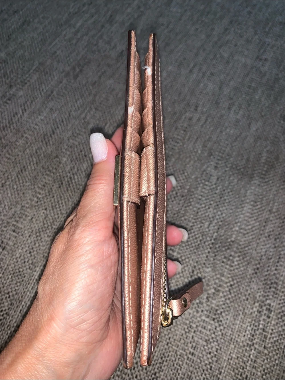 Kate Spade rose gold wallet with callouts